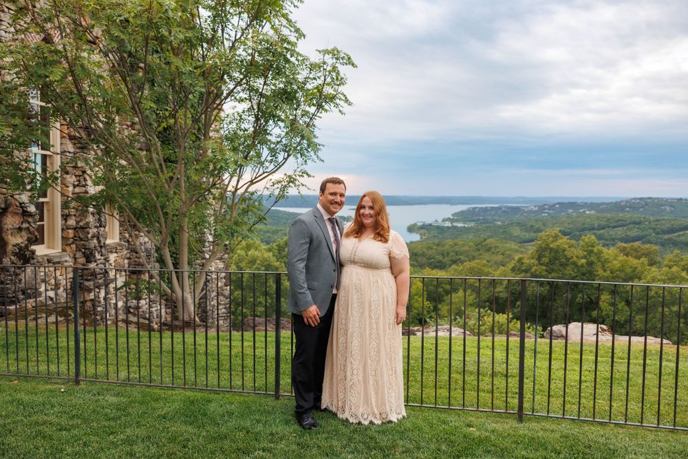 A couple getting engaged at top of the rock in Branson Missouri near big cedar lodge.
