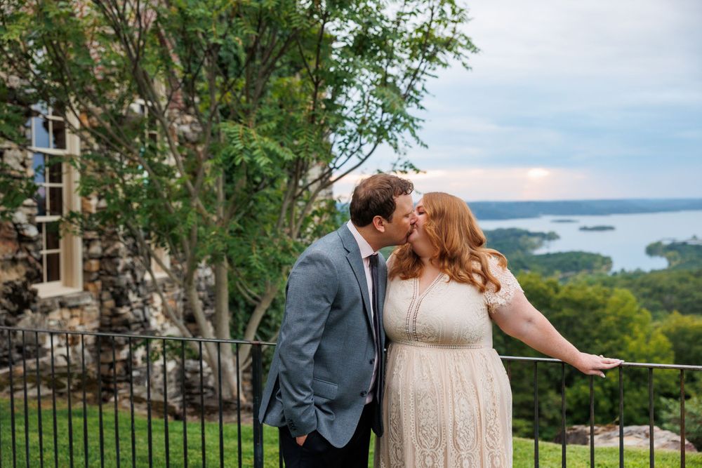 A couple getting engaged at top of the rock in Branson Missouri near big cedar lodge.
