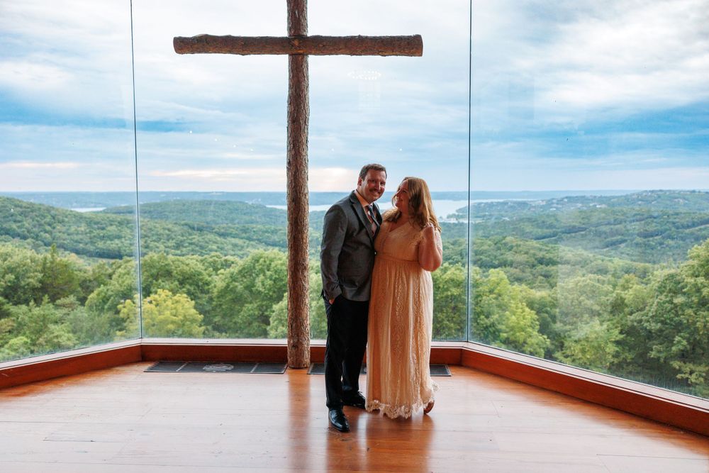 A couple getting engaged at top of the rock in Branson Missouri near big cedar lodge.