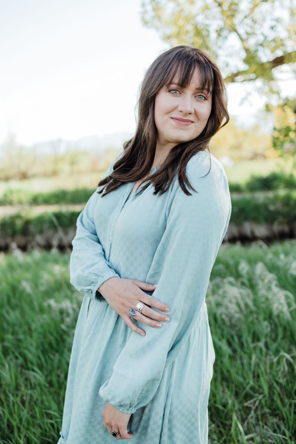 Young Woman Wearing Blue in Utah Field