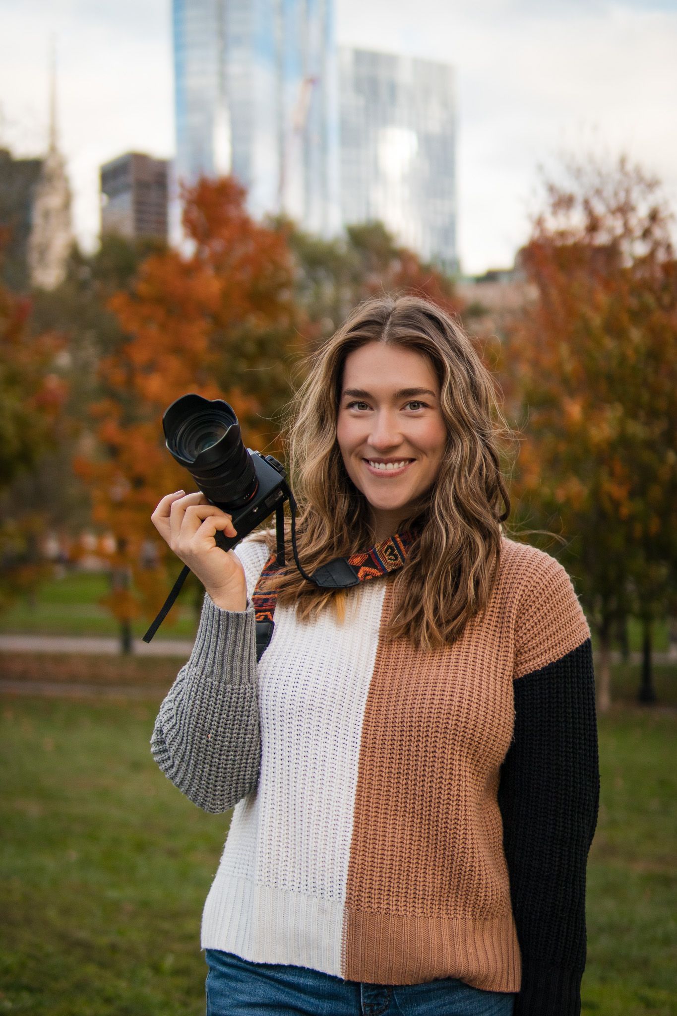 "Elopement photographer in action, skillfully capturing the love and joy of a couple tying the knot amidst the natural b