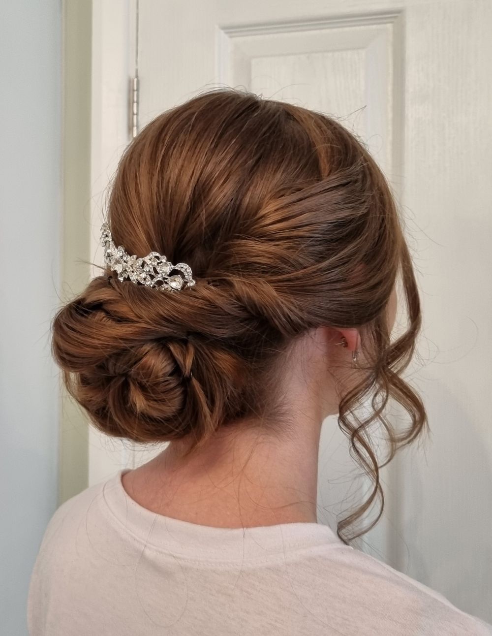 Classic bun with tendrils and diamonte accessory