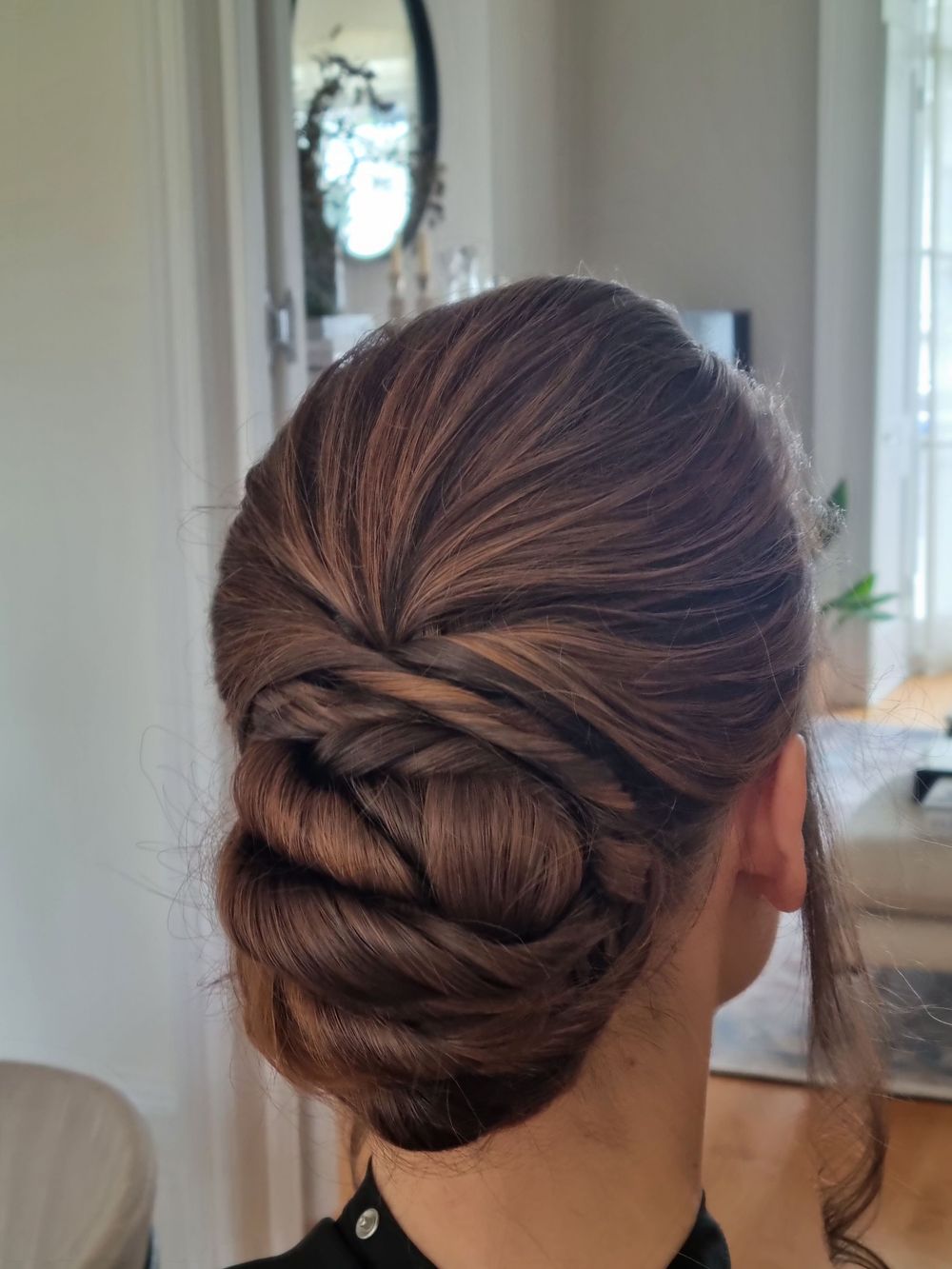 Neat structured low bun