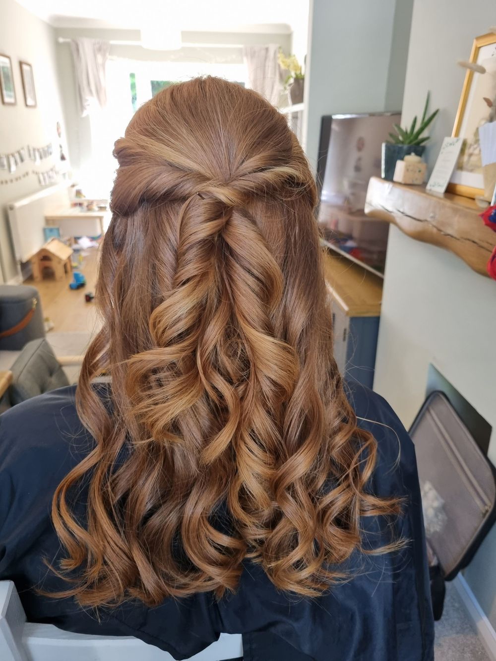Bridesmaids, curled hair with twist back sides