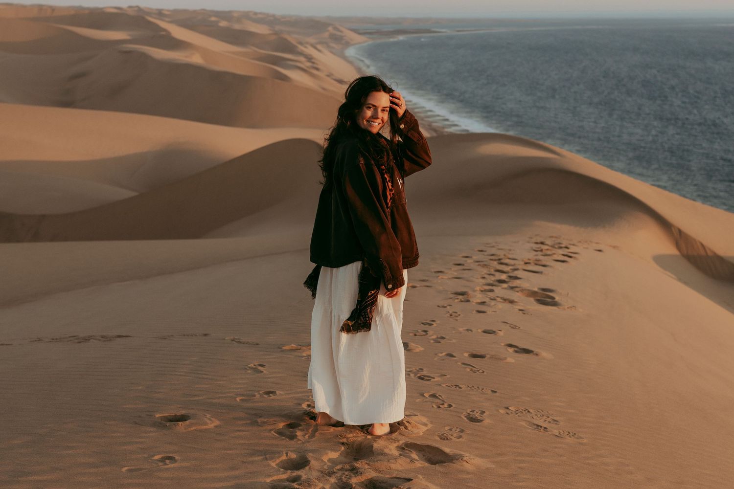 View across the towering dunes and coastline at Sandwich Harbour, Namibia