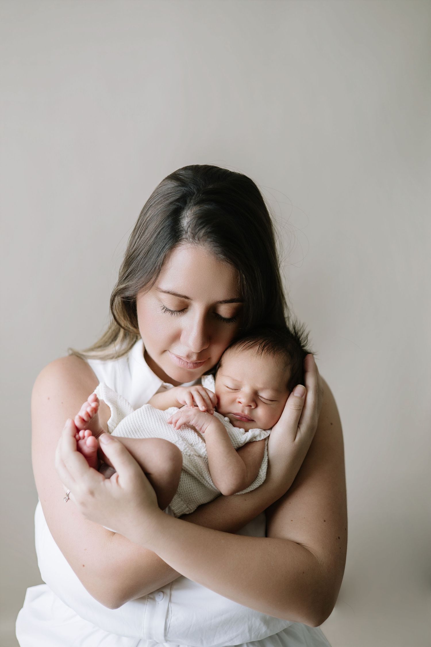 Newborn photography in Cap Cana capturing delicate details and serene moments. Elegant, soft images of your baby’s first stage.