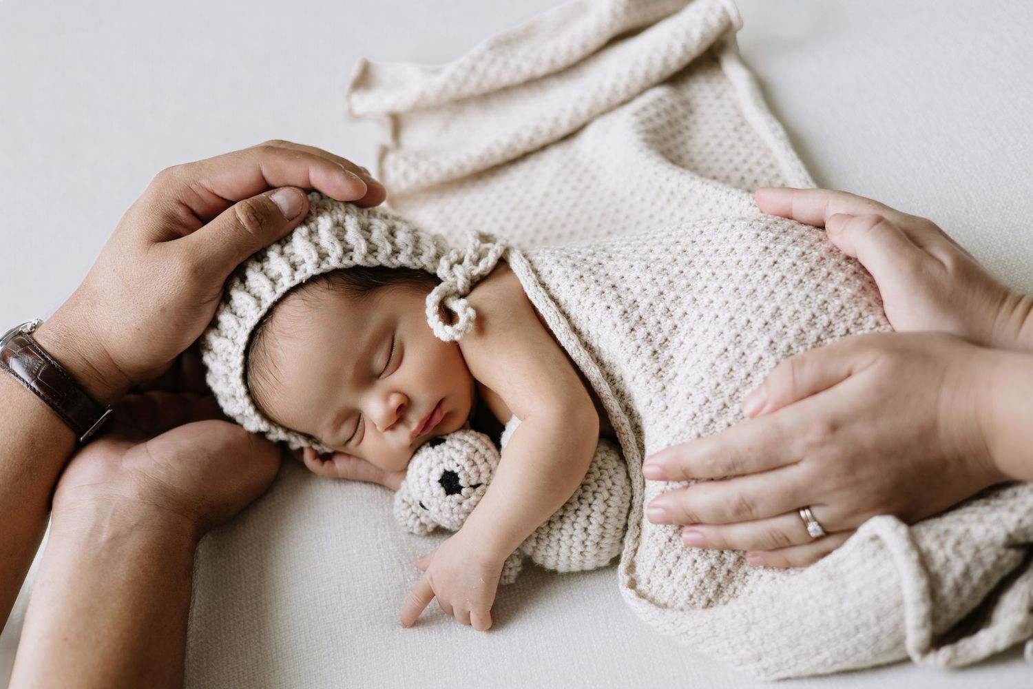 Newborn session in Cap Cana with neutral tones and gentle styling. Clean, elegant photos focused on your baby’s tiny details.