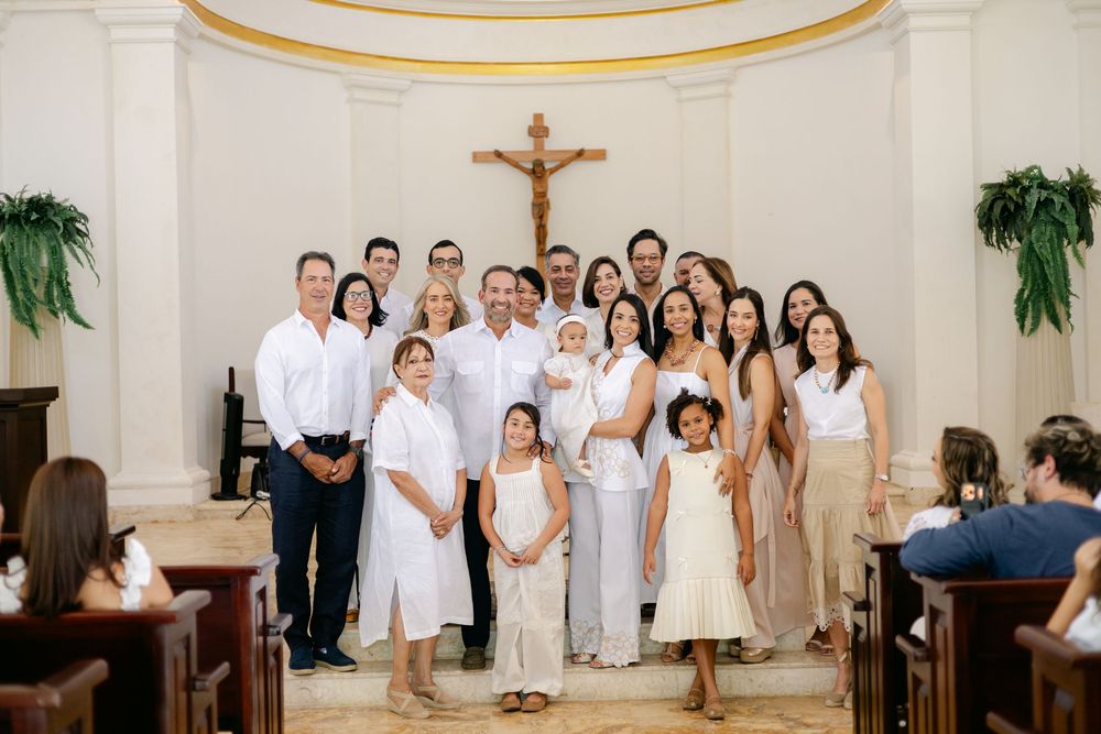 Baptism session in Cap Cana with refined decor and gentle tones. Authentic moments of faith, love, and family connection beautifully documen