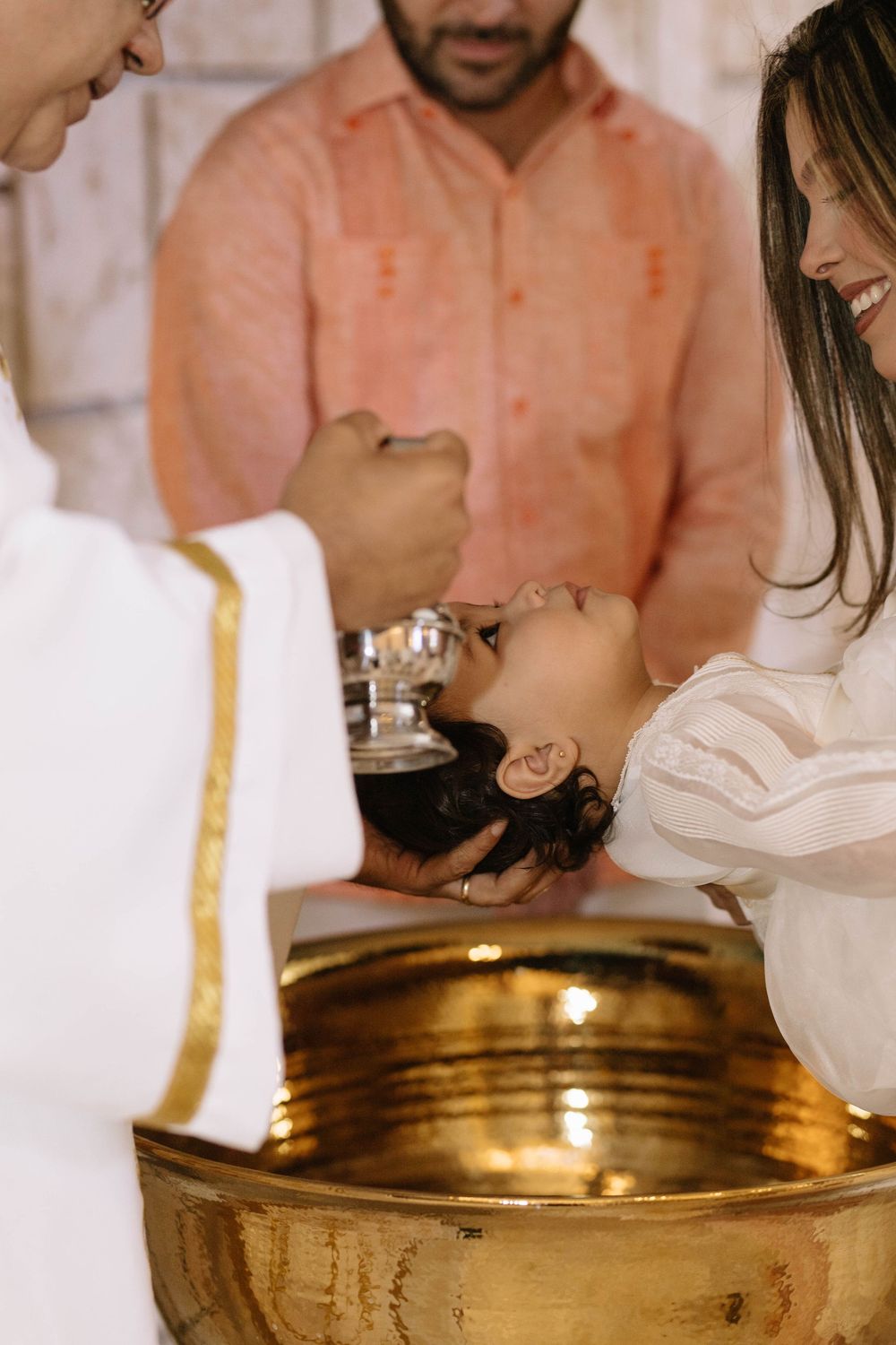 Professional baptism photographer in Punta Cana capturing timeless family memories.