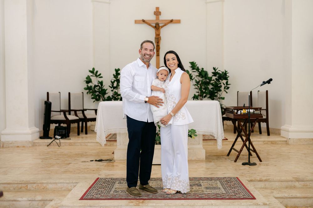 Baptism photos in Punta Cana with soft natural light and elegant church setting. Timeless images capturing this sacred family celebration.