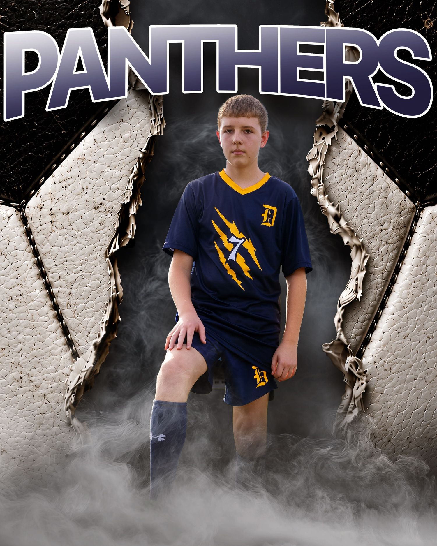 Young soccer player in navy Panthers uniform poses dramatically against a torn metal background with smoke effects.