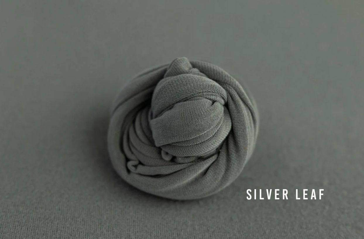 Silver leaf gray soft knit wrap and hat set coiled for newborn photography.