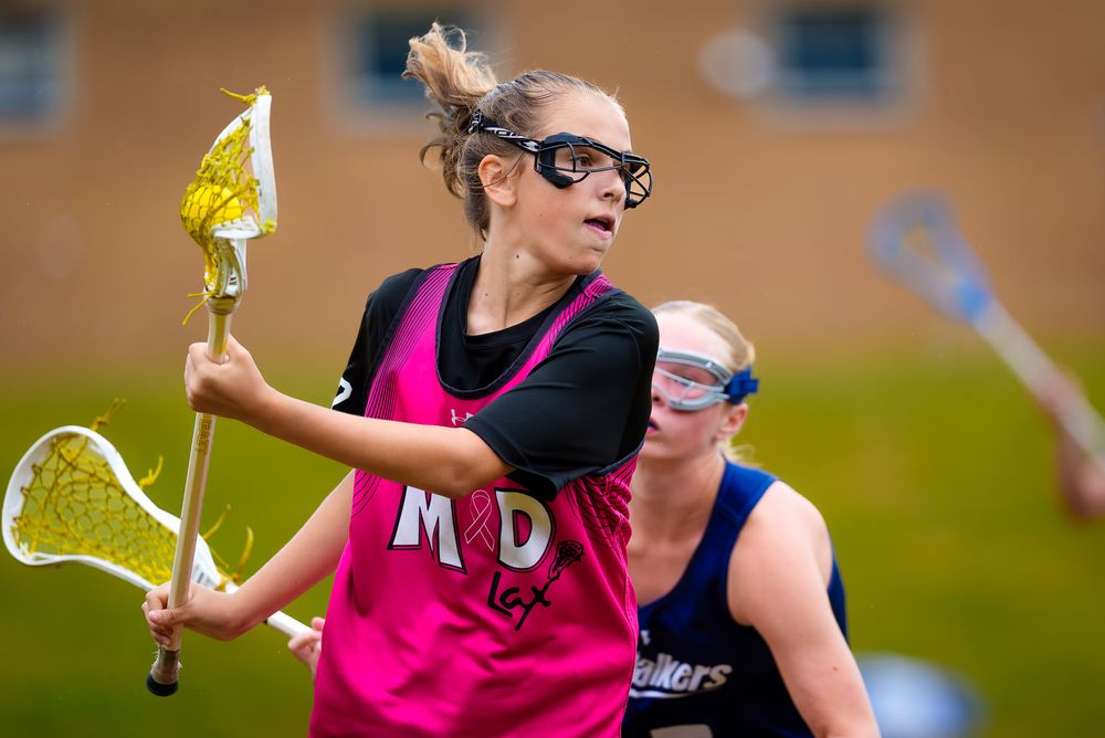 M&D Black 2031 winds up a shot against Sky Walker Blue at Summer Genesis Origins, by Deanna Fox, SportsFox Photography based in Hershey PA