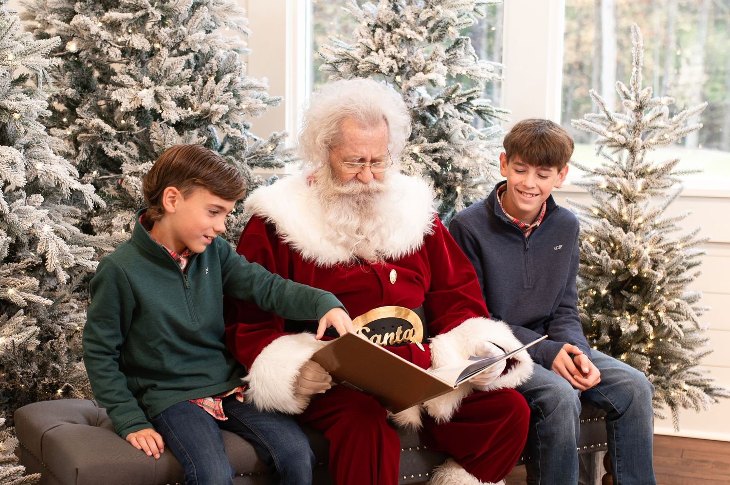 Festive holiday scene with Santa Claus and children in traditional Christmas setting.