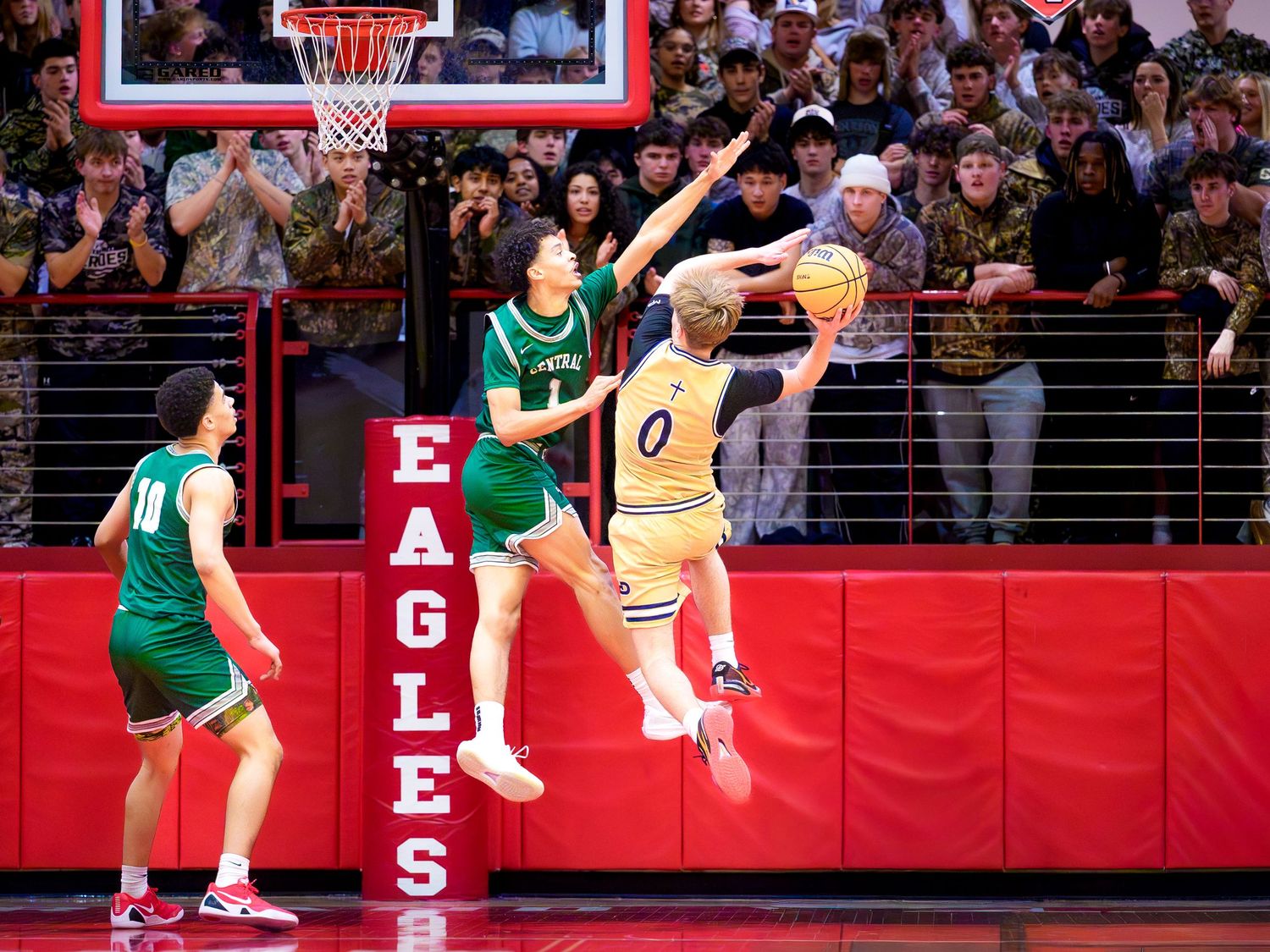 Central Dauphin and Bishop McDevitt battle near the basket, Mid-Penn championship, by Deanna Fox, SportsFox Photography based in Hershey PA