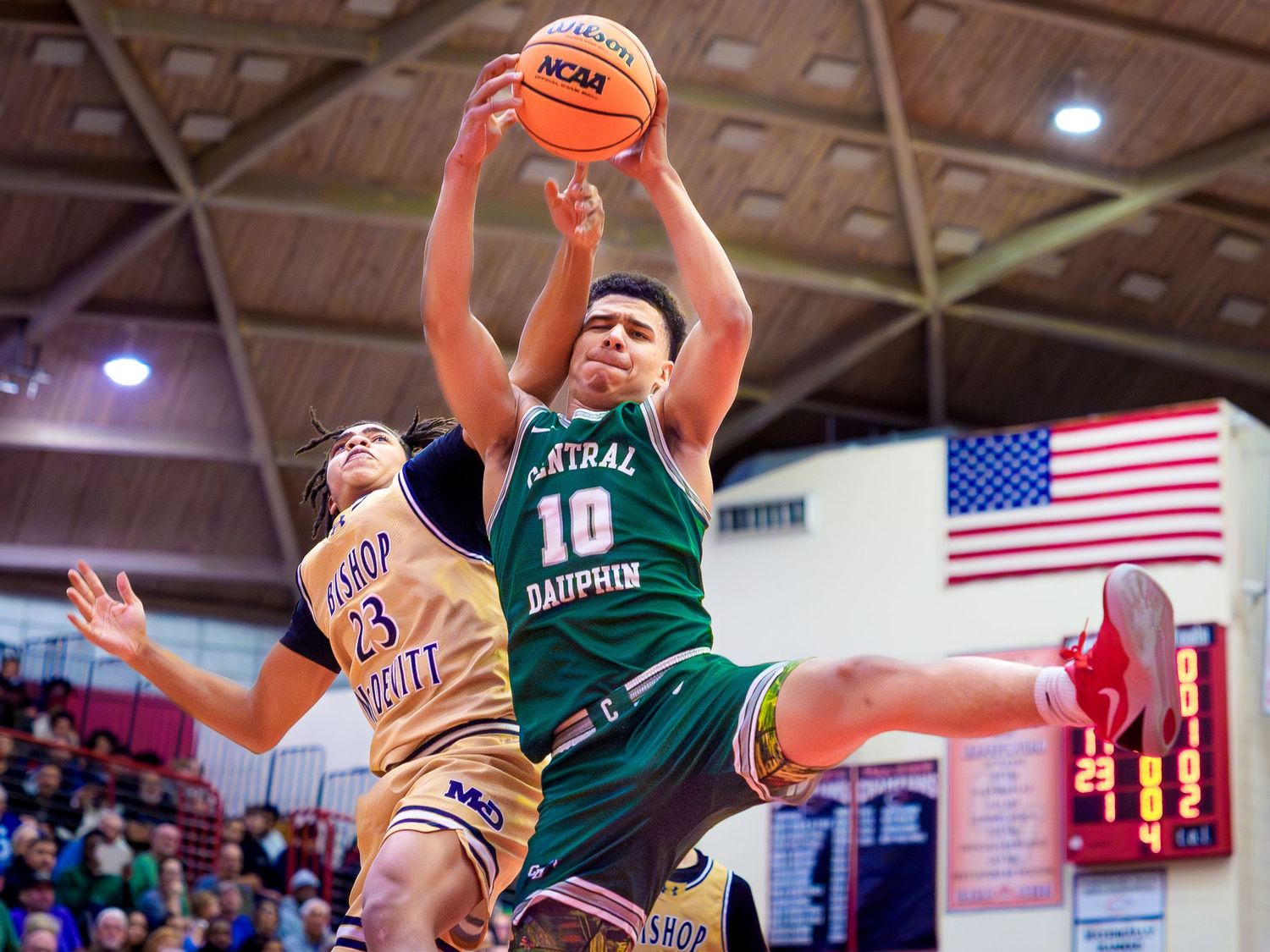 Central Dauphin #10 rising for a shot over Bishop McDevitt, Mid-Penn championship, by Deanna Fox, SportsFox Photography based in Hershey PA