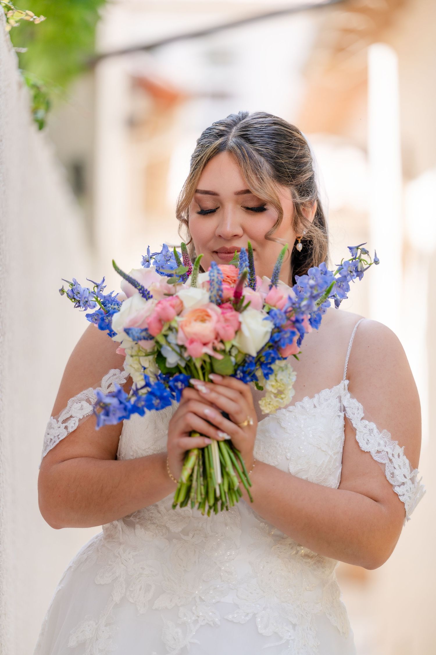 Lovely bride holding bouquet