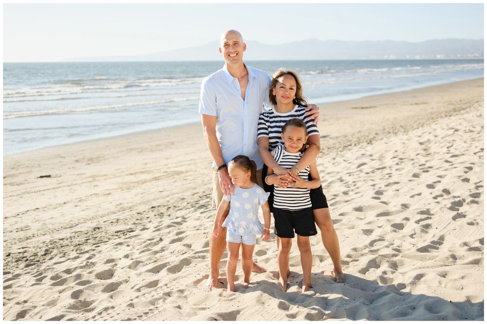 Family portrait on the beach during a Punta Mita family photo session.