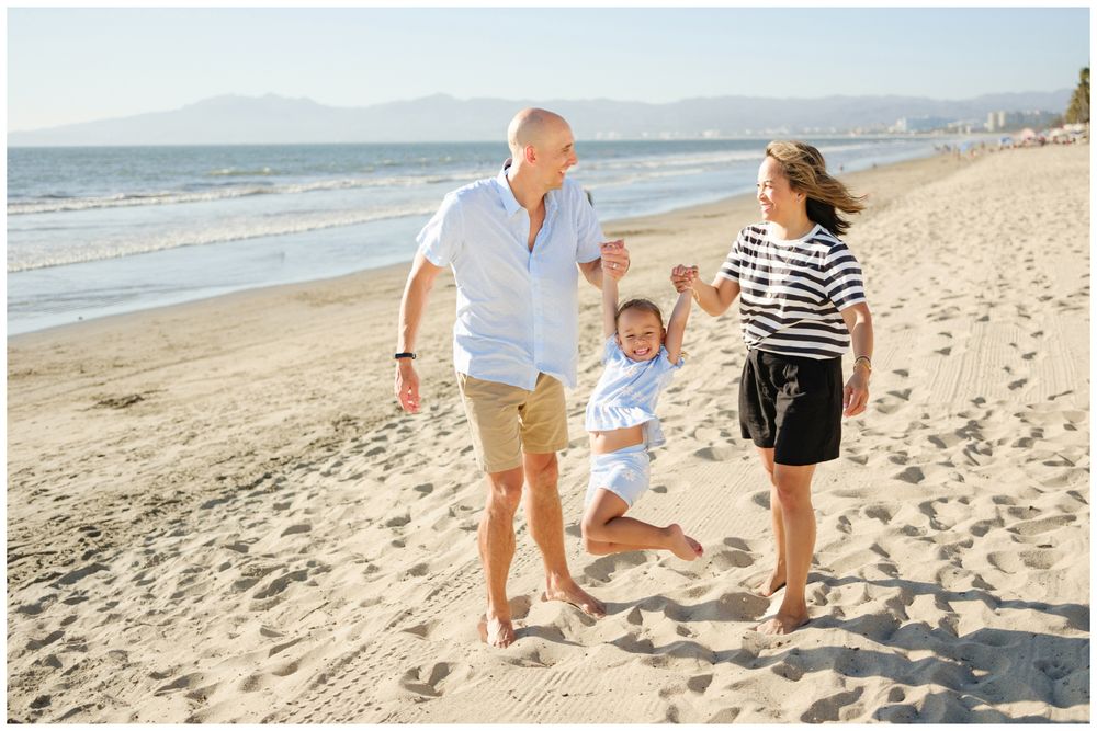 Parents hugging their children during a Punta Mita family photography session.