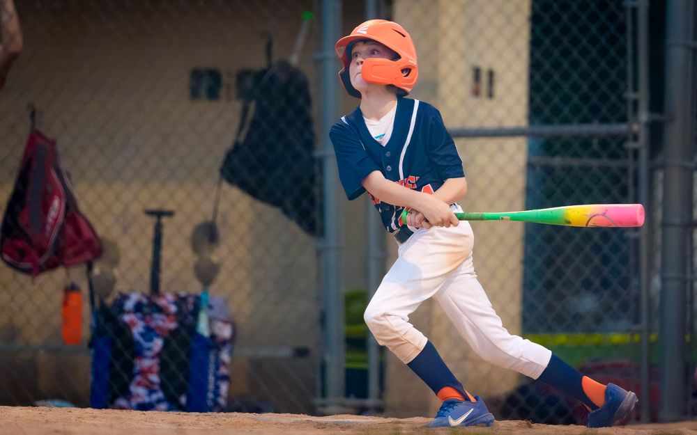 Hershey 11U Blue batter follows through on a swing during the District 6 Championship game against Hampden, by Deanna Fox, SportsFox Photogr