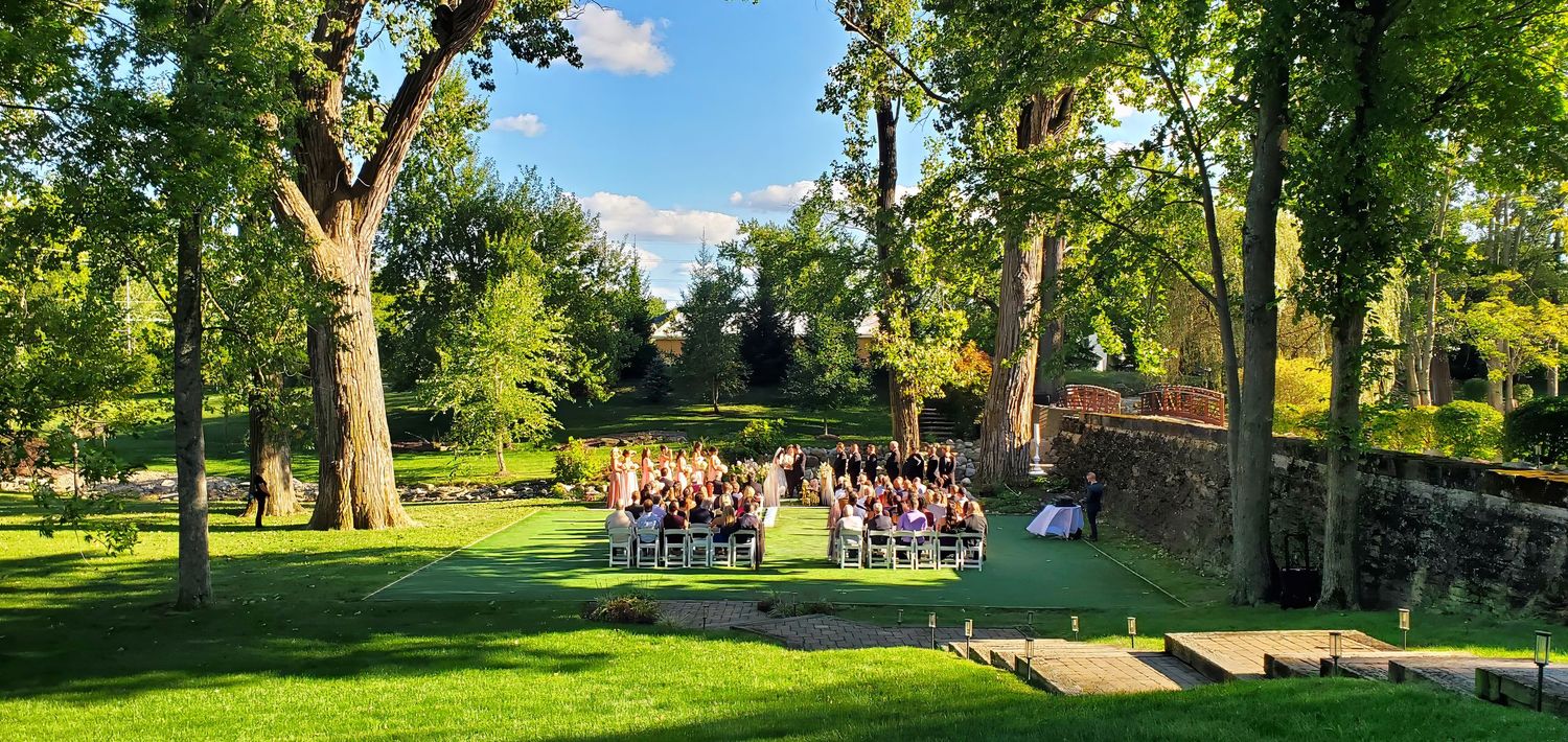 Outdoor wedding ceremony at Swan Lake Event Center Wedding Venue