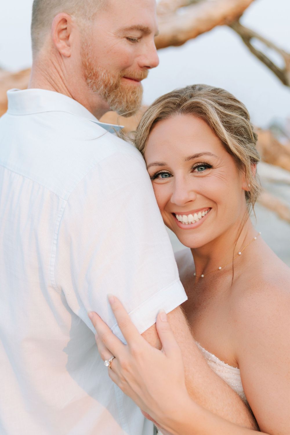 Rachel’s close-up engagement portrait at Driftwood Beach, with hair and makeup by Hannah Ashley a trial for her Villas by the Sea wedding