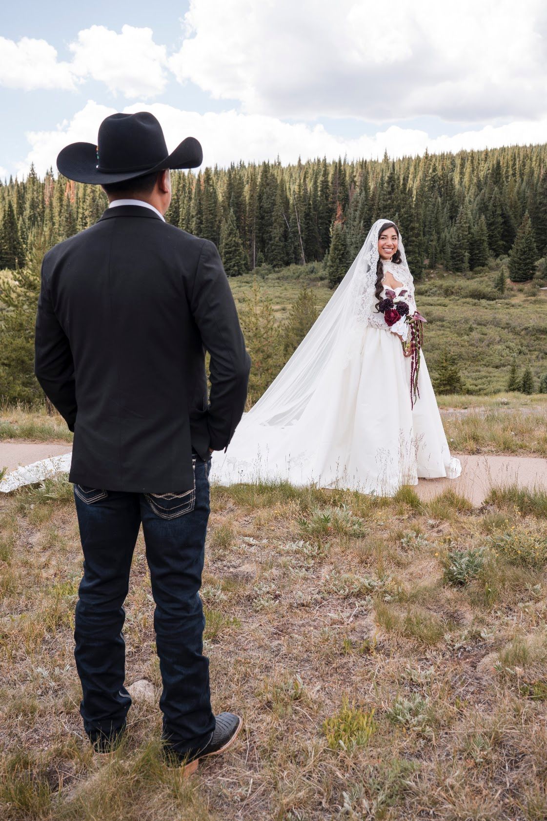 Bride and groom first look in the Colorado mountains photographed by JDF Media