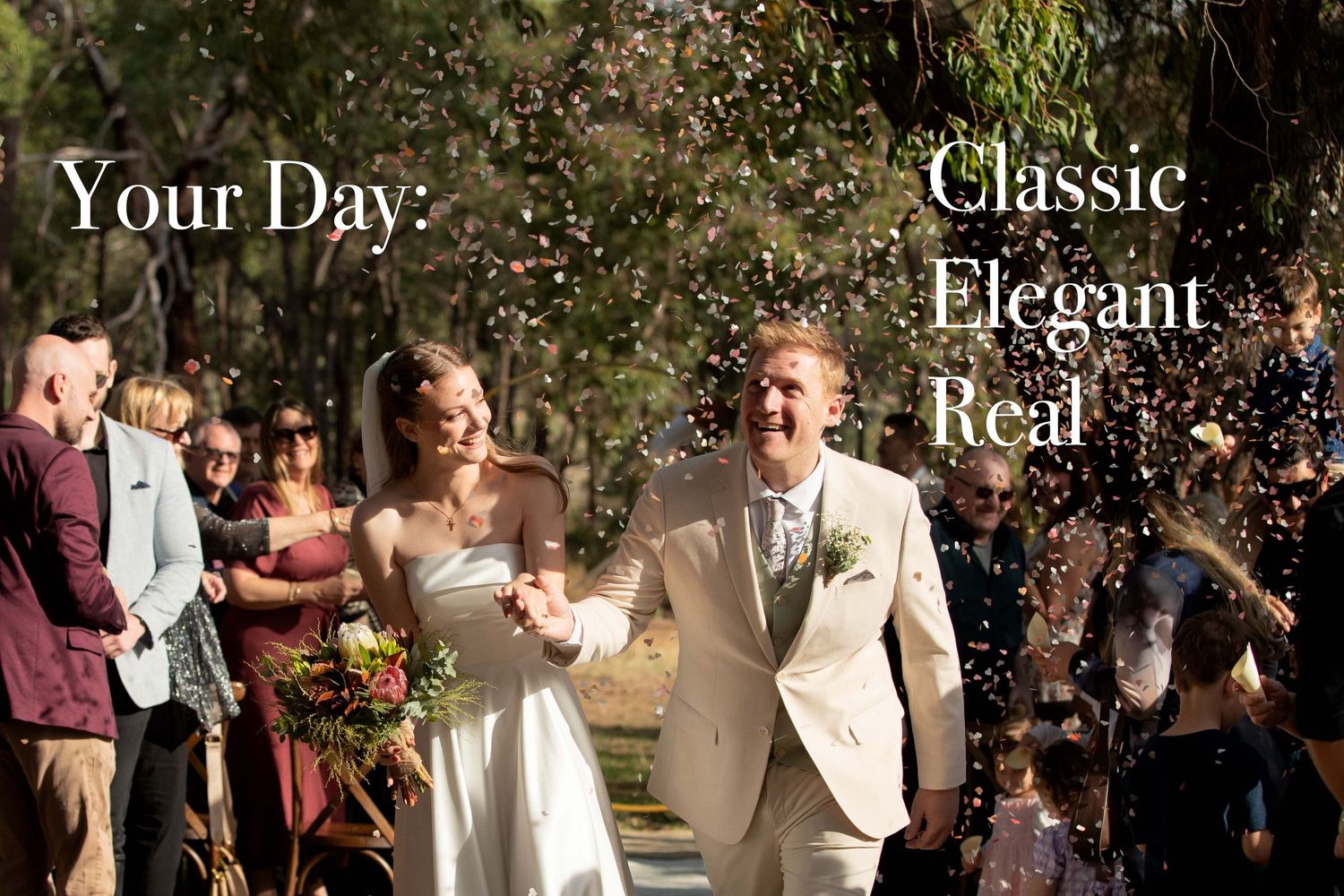 A joyful bride and groom walk hand-in-hand through a confetti shower at their classic, elegant outdoor wedding ceremony.