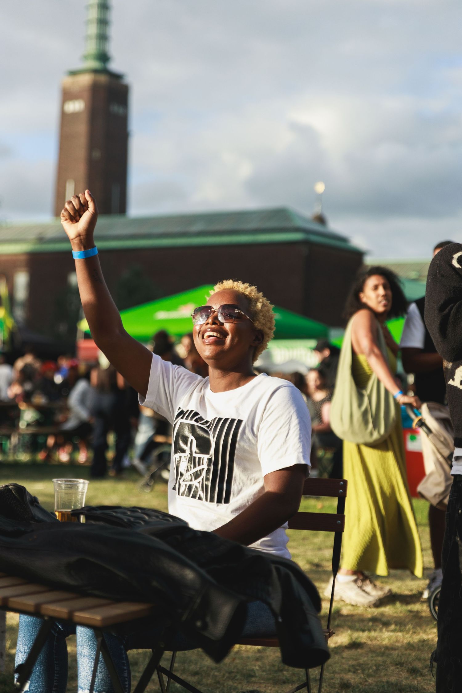Woman enjoying the vibe during event coverage of African Food Festival 2026 by Netherlands photographer CKA Visuals.