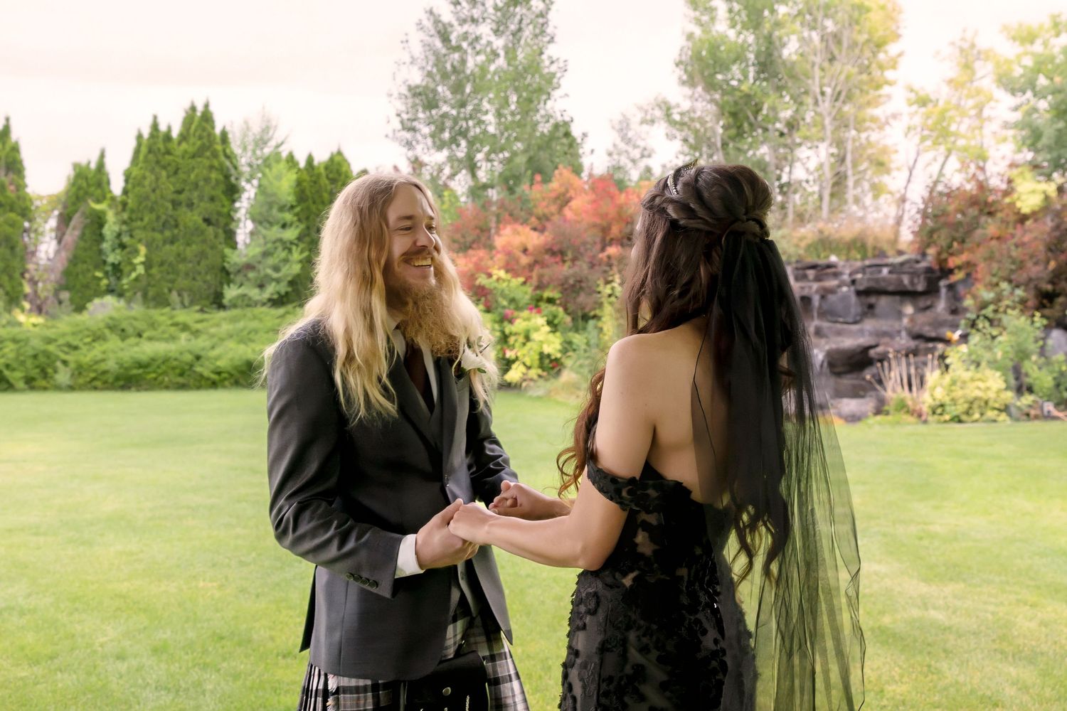 Castle Gardens Kuna Idaho ©Milestones Studios LLC groom smiling at first look