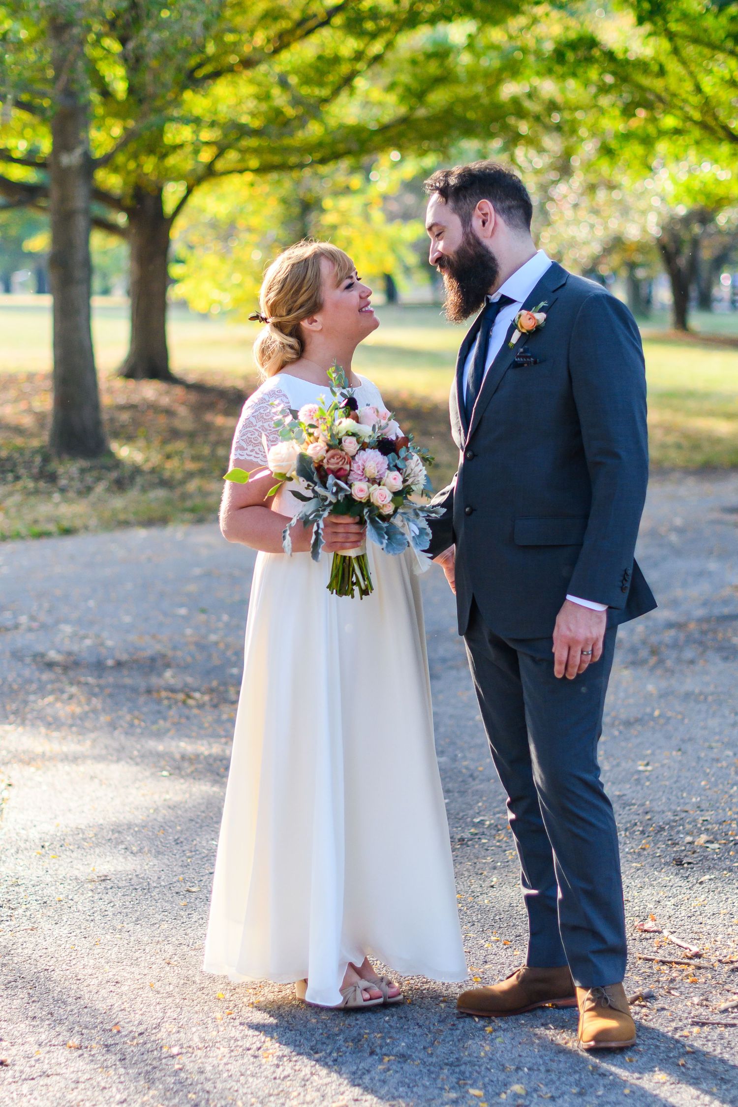 Close-up sequence of a tender romantic moment between newlyweds at their wedding.