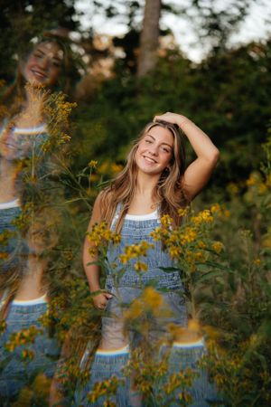 Candid sequence in a field of yellow wildflowers during golden hour.