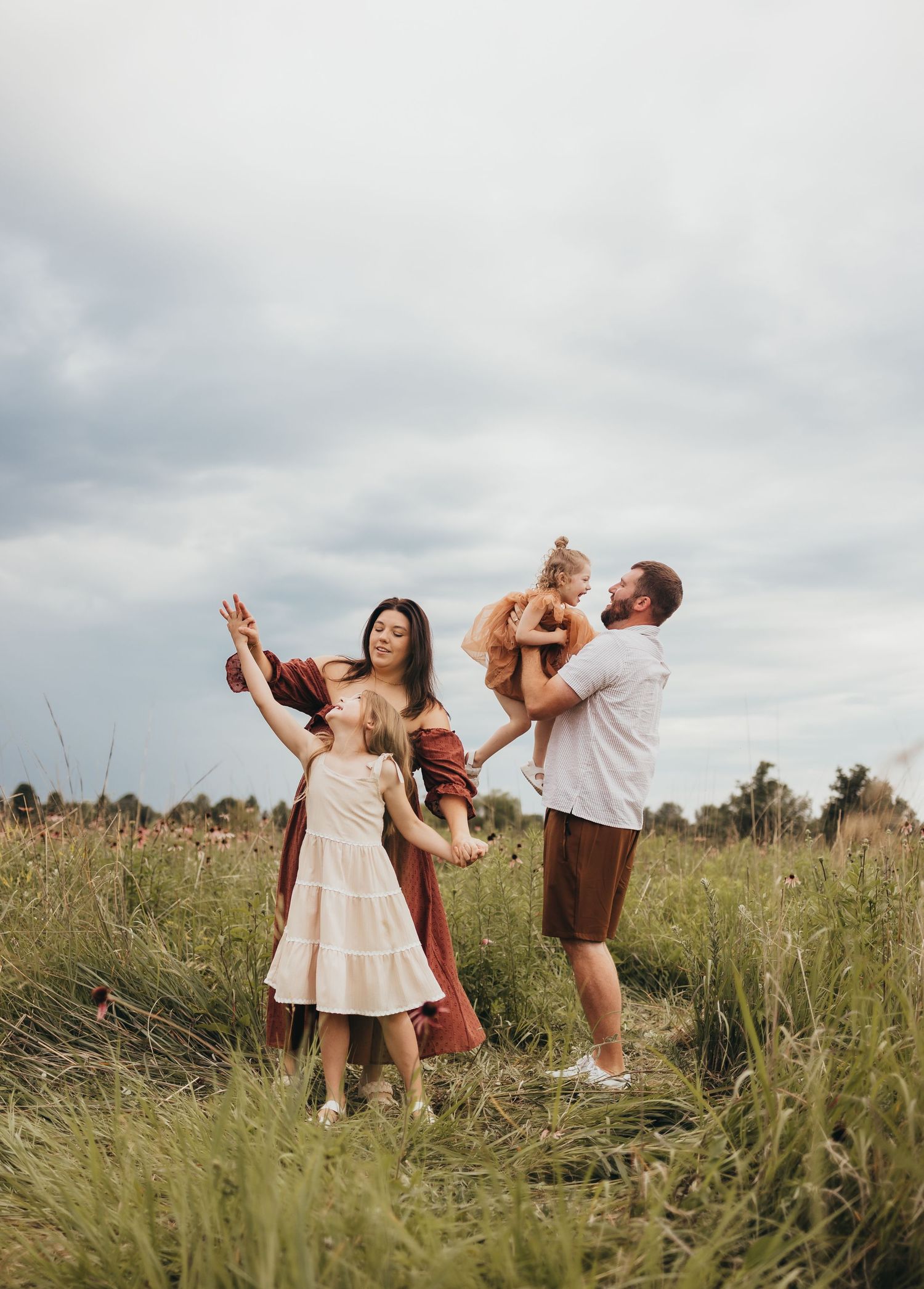 Photographer taking photo of bride and groom behind the scenes