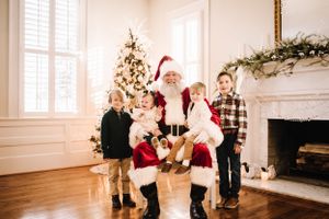 Christmas scene with Santa Nashville family photographer specializing in natural light, candid storytelling, and timeless portraits.
