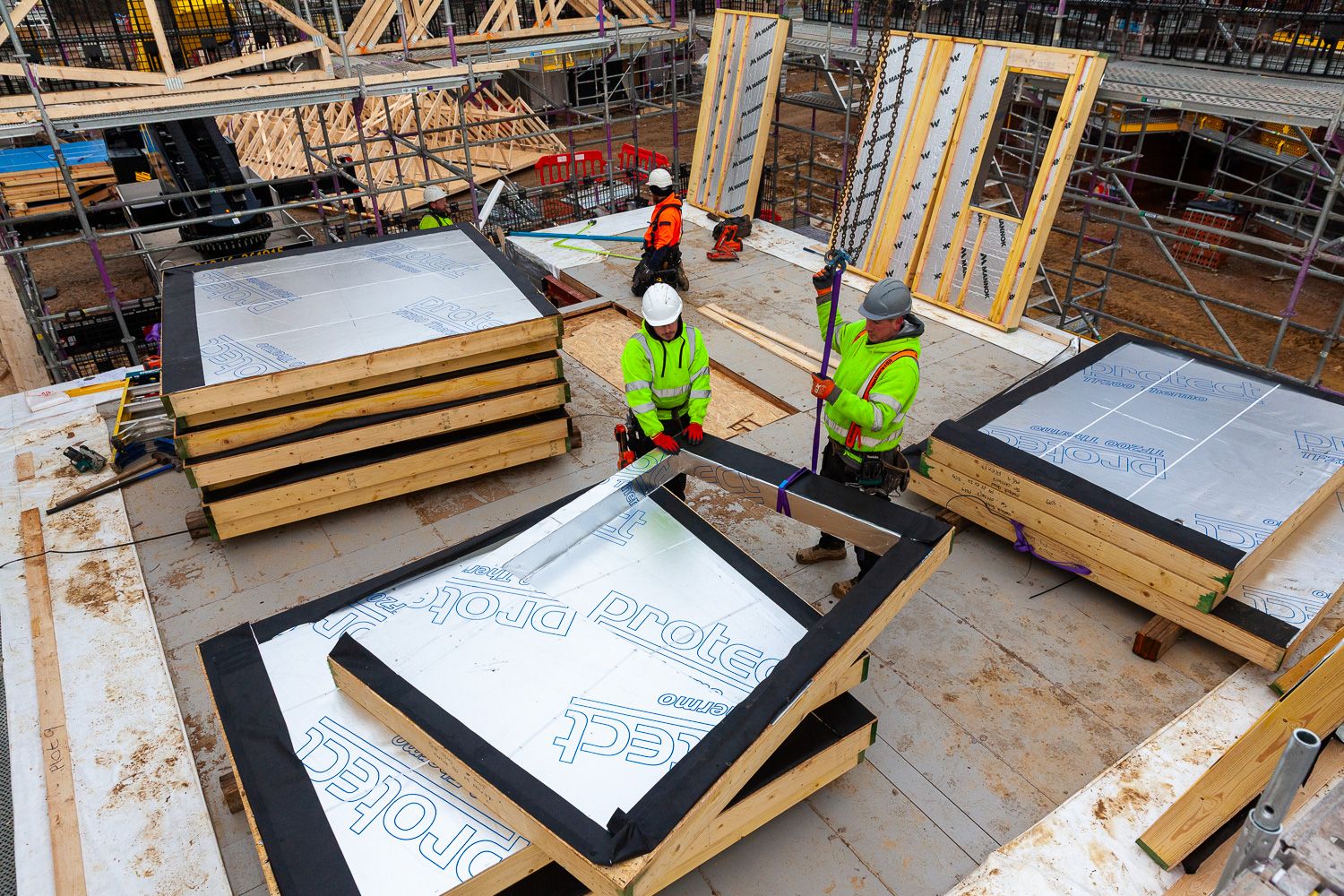 Construction drone photograph of timber frame house construction