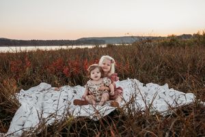 Beautiful sunset family photography session near a lake with natural scenery in Cullman, AL by a North Alabama photographer.