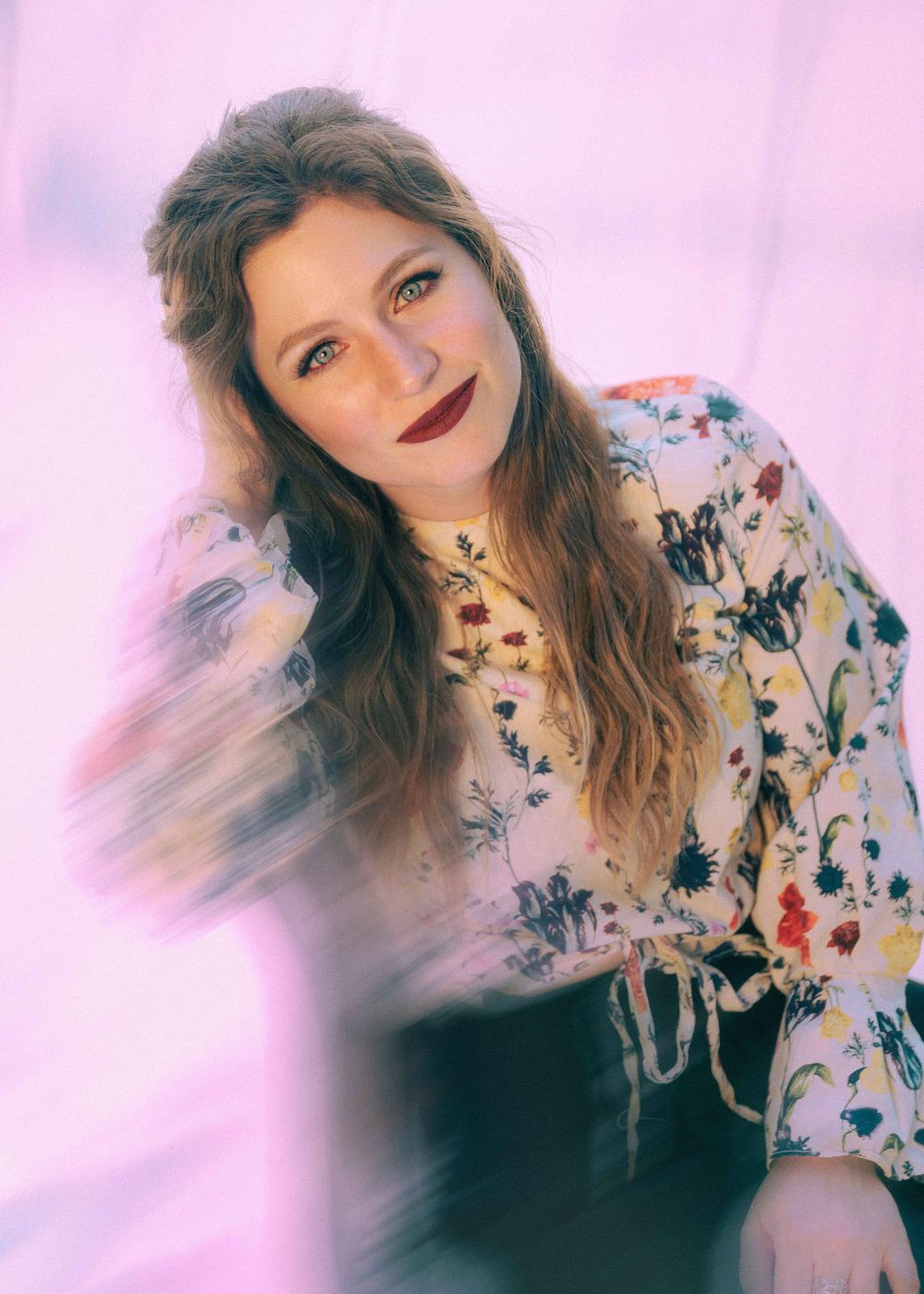 Colorful portrait of woman outdoors.