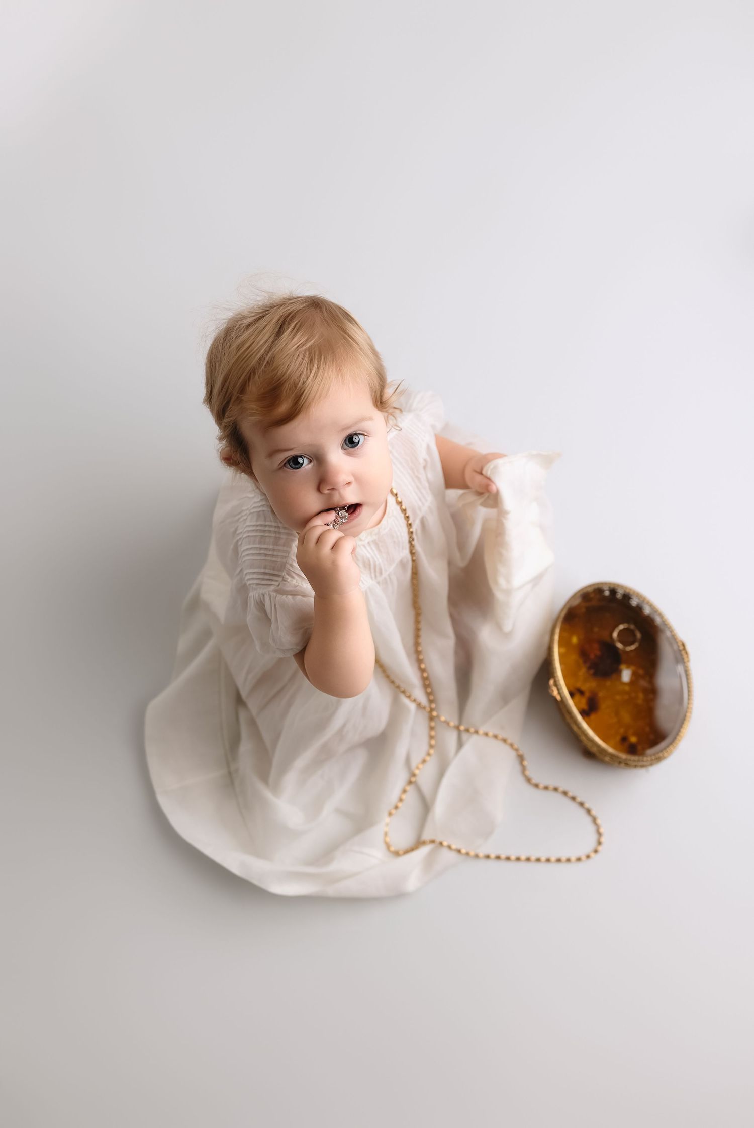 Charlottesville photographer, baby, newborn, maternity, family, baby girl with white antique dress  and handkerchief for milestone session.