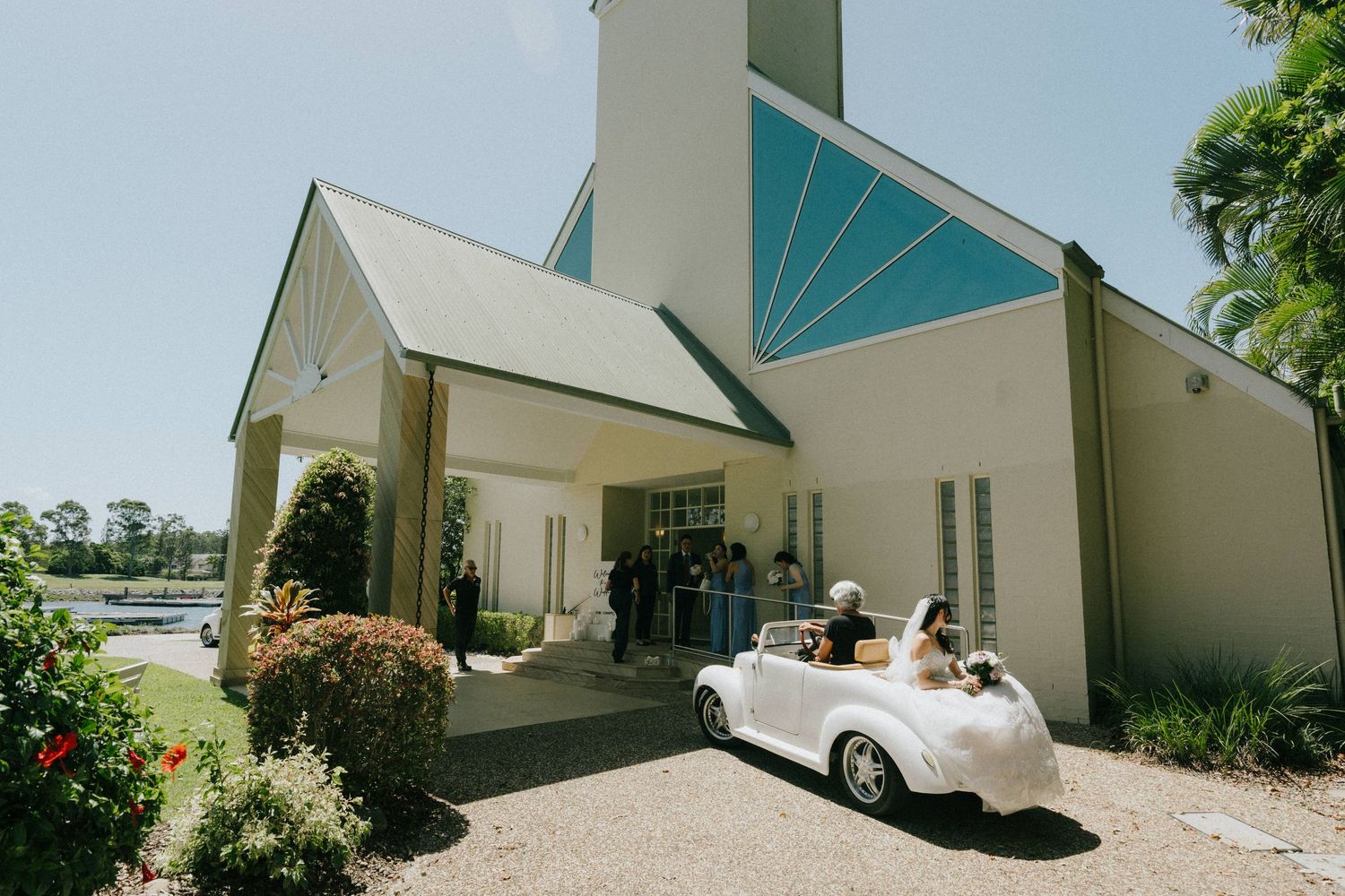 bride in vintage car at InterContinental Sanctuary Cove, for Australia wedding photography"
