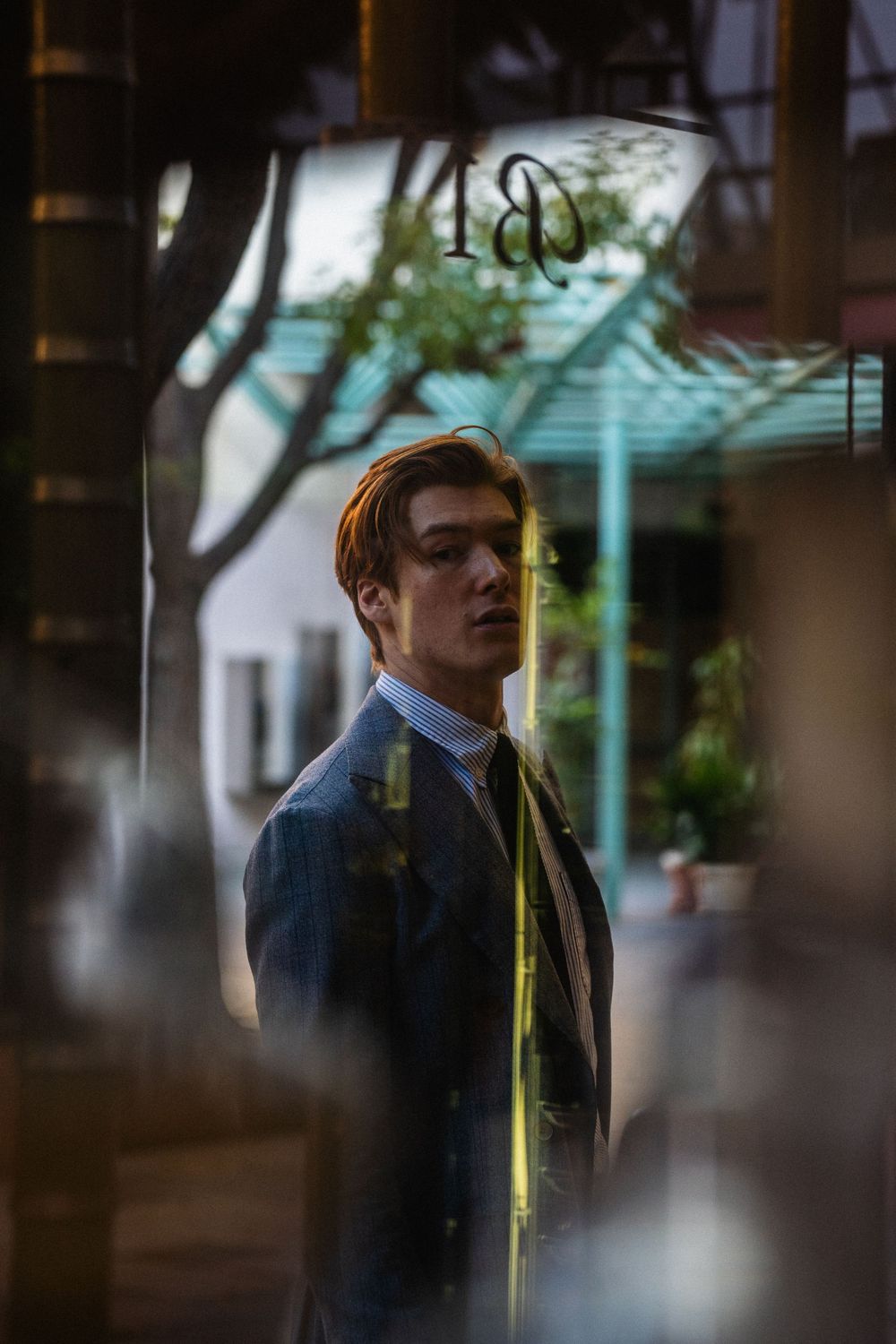 Model headshot with cinematic mood and styling