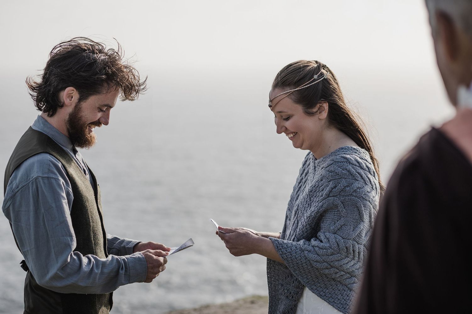 Couple exchanging vows during sunset elopement at Hags Head Cliffs of Moher