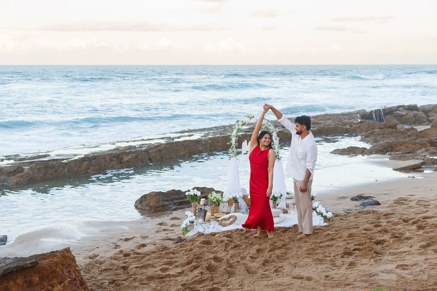 Couples portrait. Proposal and engagement session. Man and woman on the beach. Kikita Surf Beach, Dorado, Puerto Rico.