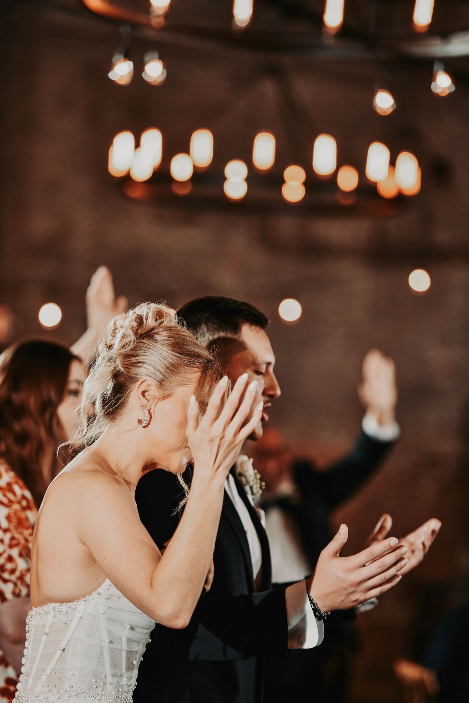Christian prayer shared during elegant wedding reception