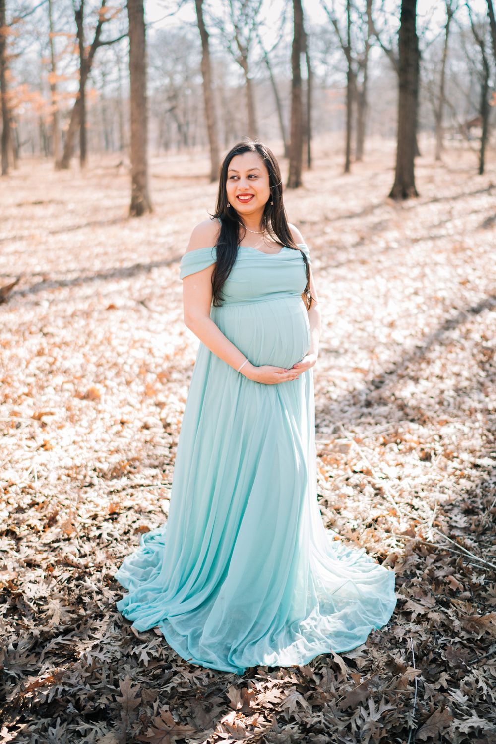February maternity portraits in the forest. Copyright Two Birds Photography 2026.