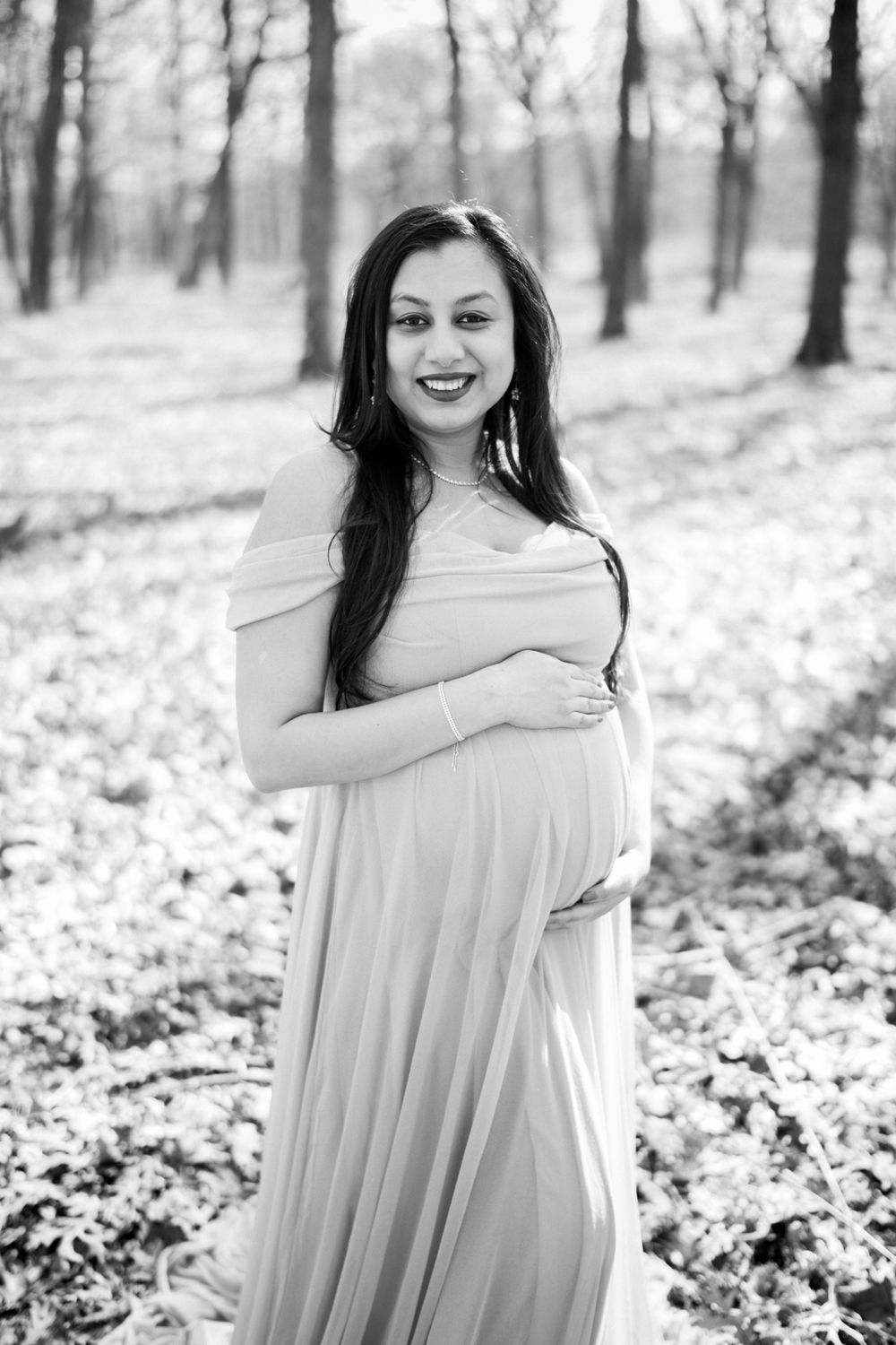 February maternity portraits in the forest. Copyright Two Birds Photography 2026.