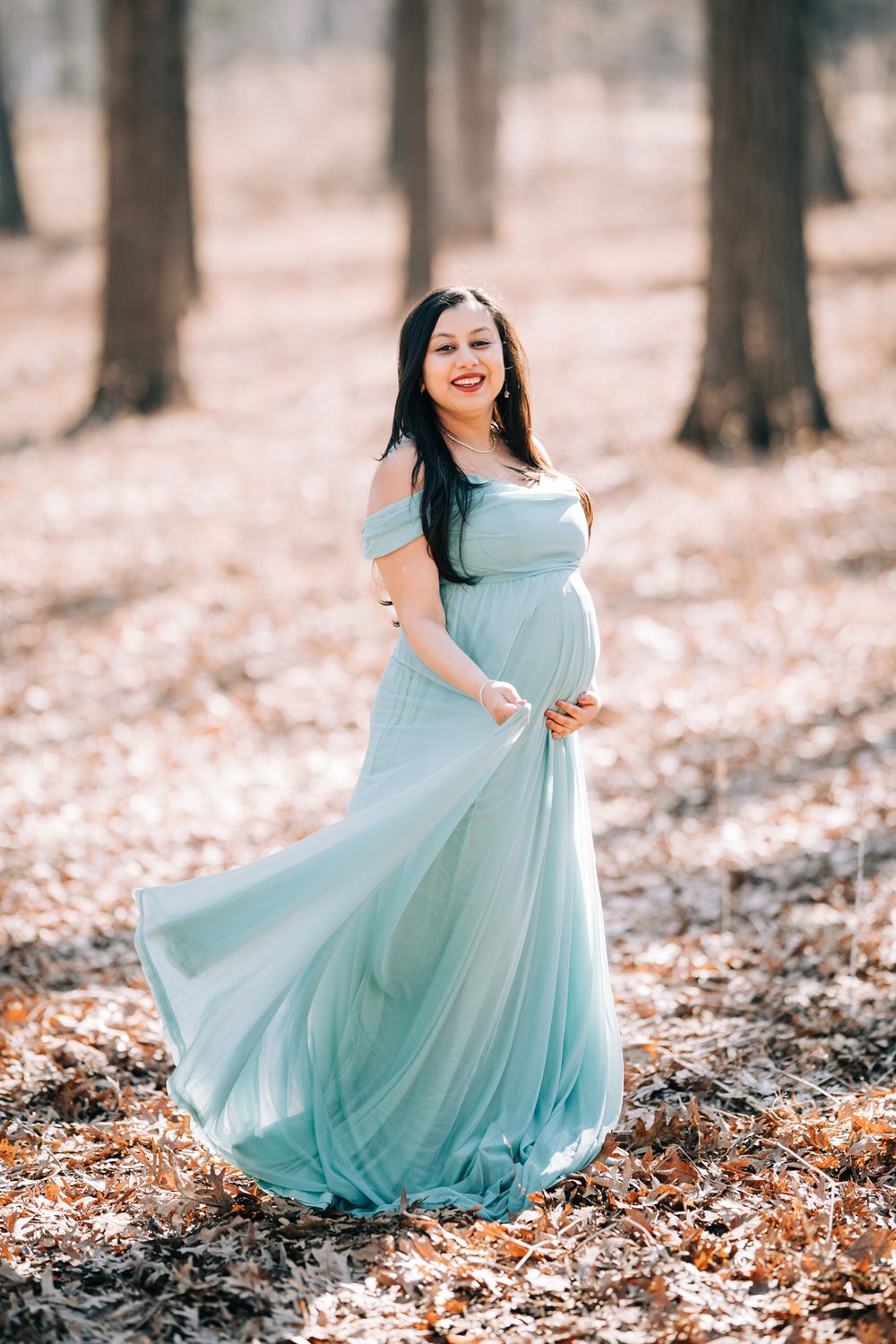 February maternity portraits in the forest. Copyright Two Birds Photography 2026.