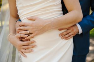A series of romantic wedding photos showing close-up details of couples embracing in formal attire.