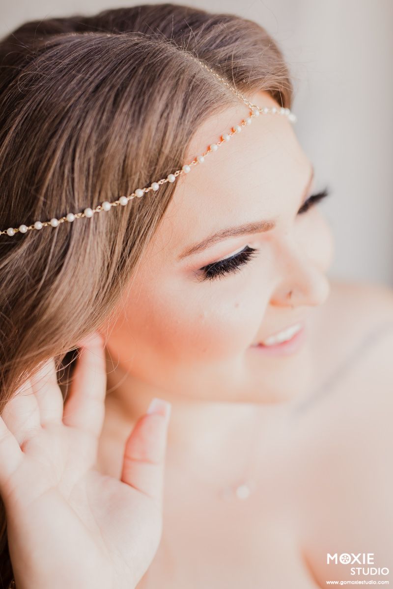 Close-up bridal portraits showing delicate pearl headpiece details against soft lighting and white veil.