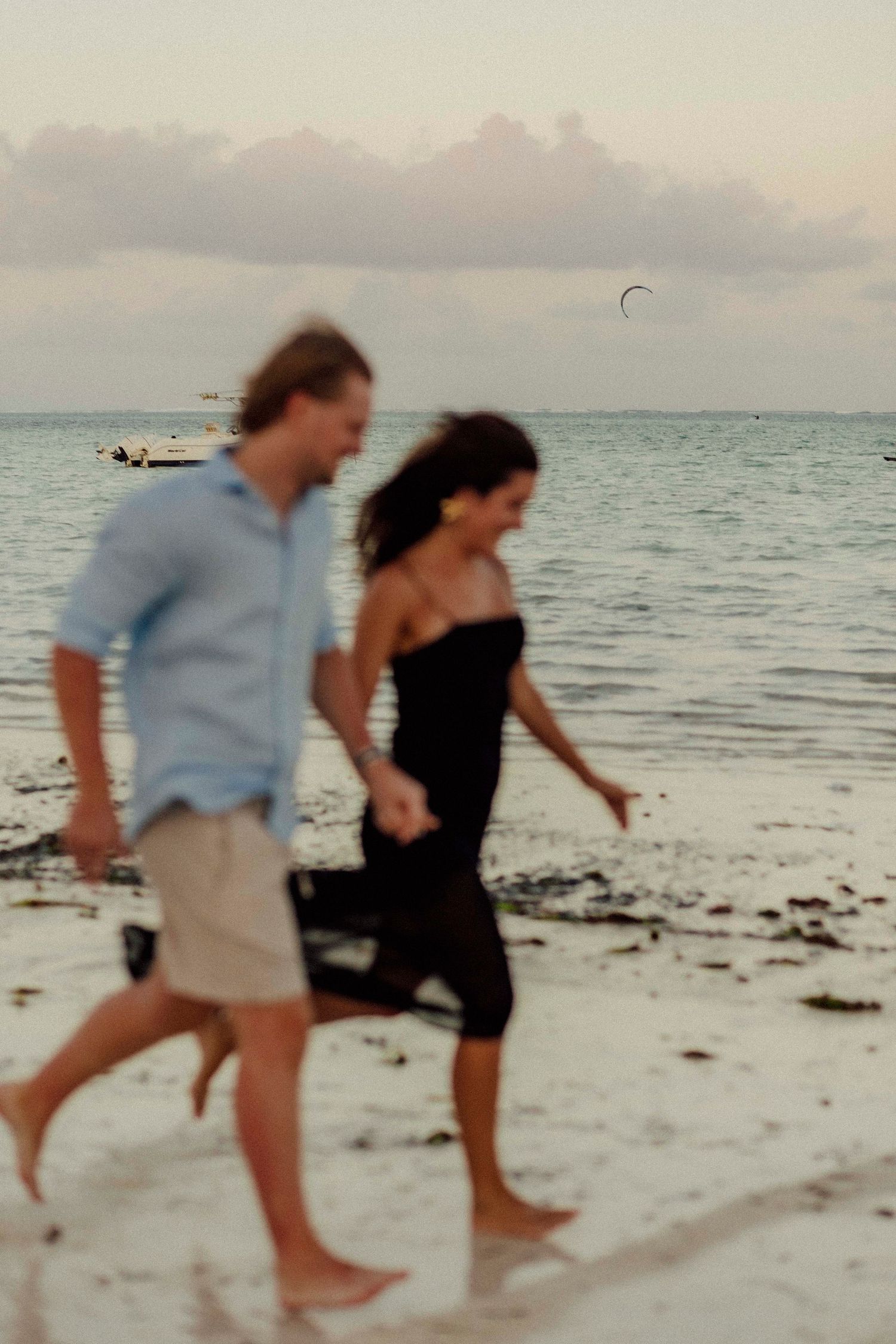 Natural, intimate couple shots at sunrise on Jambiani Beach