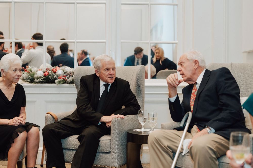 Yorktowne Hotel wedding in York, PA – candid photos of guests during cocktail hour – elegant winter wedding